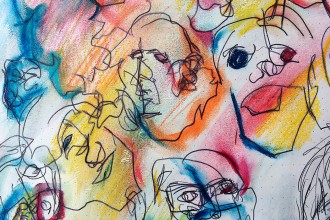 A pen and pastel drawing on white paper of caricatured and loosely drawn faces. The faces are defined in black pen, while blue, orange, pink, red, yellow and green pastel is smeared between and around the outlines. The texture of the paper is visible.