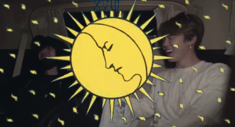 An image of Yoongi and Jimin from BTS, with a moon and flecks of light taken from the Ryder Waite tarot deck in yellow superimposed over the top of the image.