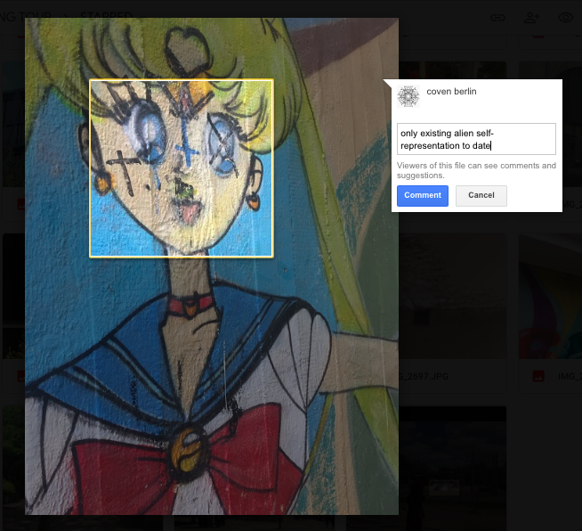 Graffiti of Sailor Moon on a wall with a satanic cross on her forehead with comment "only existing alien self-representation to date".