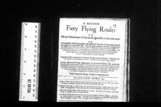 There is an image of a Ranter address. The address is on white paper with black ink. Alongside the address is an image of a white ruler. The ruler and address are against a black background.